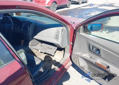 2003 Cadillac Cts Standard z USA, uszkodzony, nr VIN 1G6DM57NX30121226